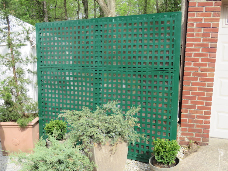 Hide unsightly views with lattice backed with landscape cloth